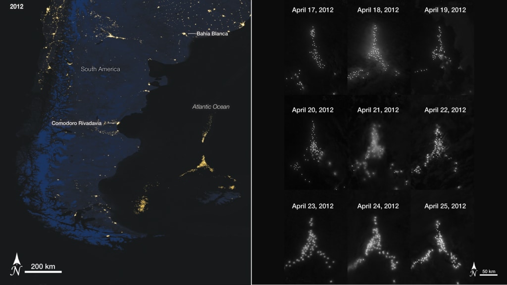 Imagen satelital nocturna con puntos de luz de flotas pesqueras.